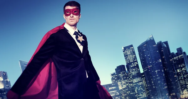 Superhero Businessman in modern city — Stock fotografie