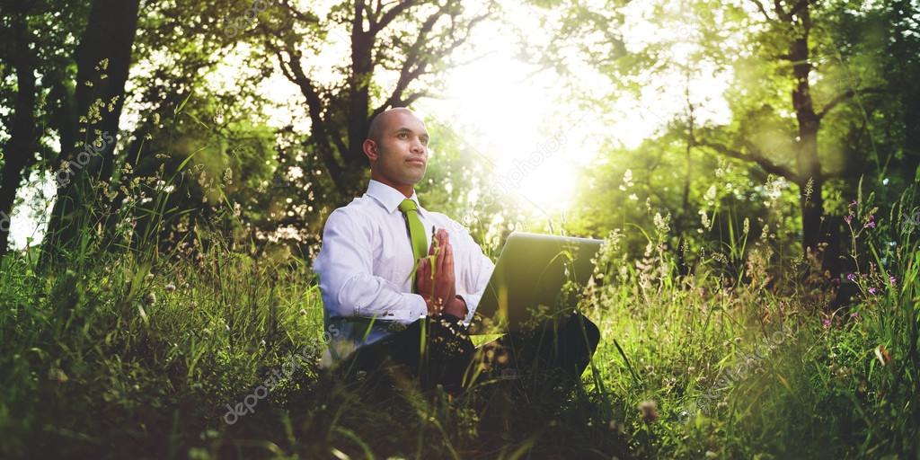 Green Businessman Meditation Concept