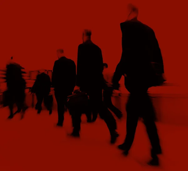 Dark Silhouettes of Business People Walking — Stock Photo, Image