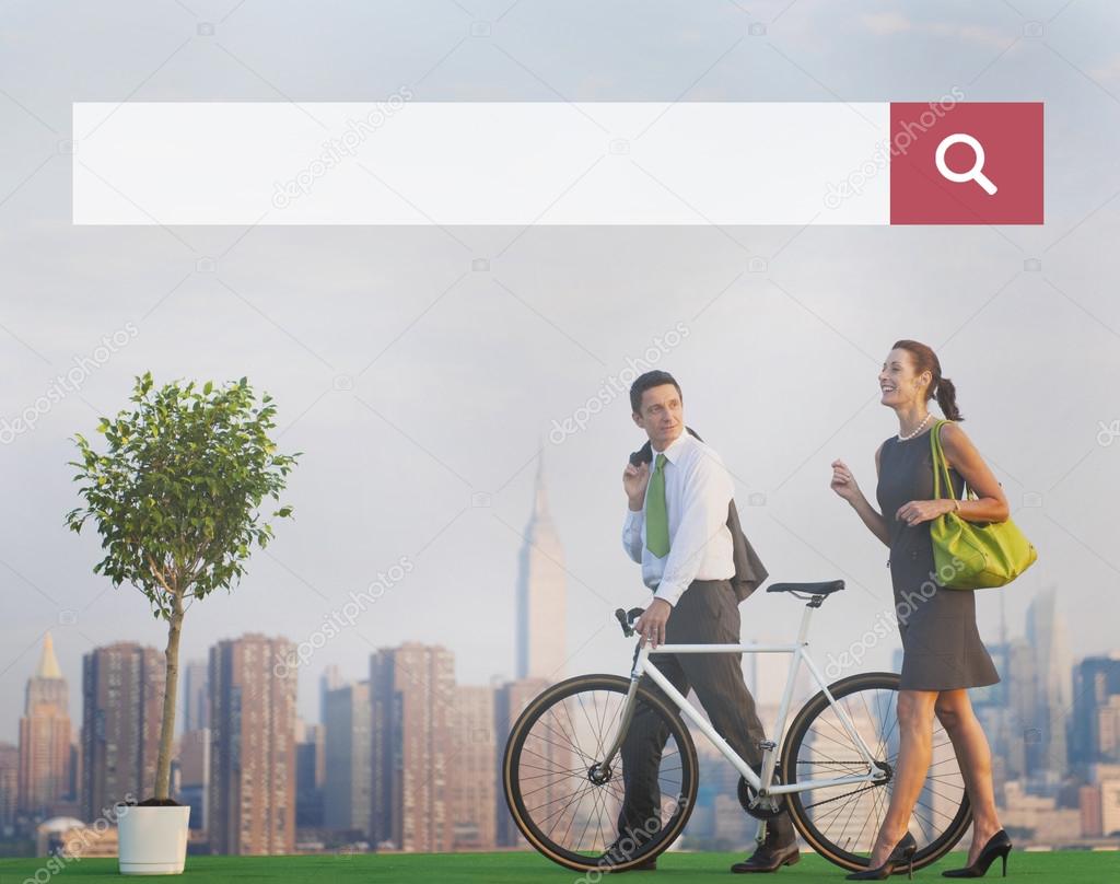 Business couple with bicycle