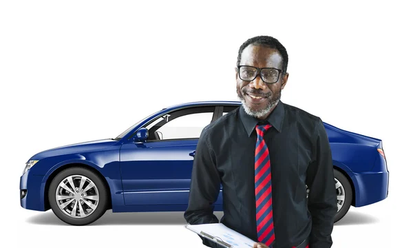 Man with Car behind him — Stock Photo, Image