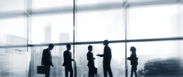 Business people silhouettes — Stock Photo, Image