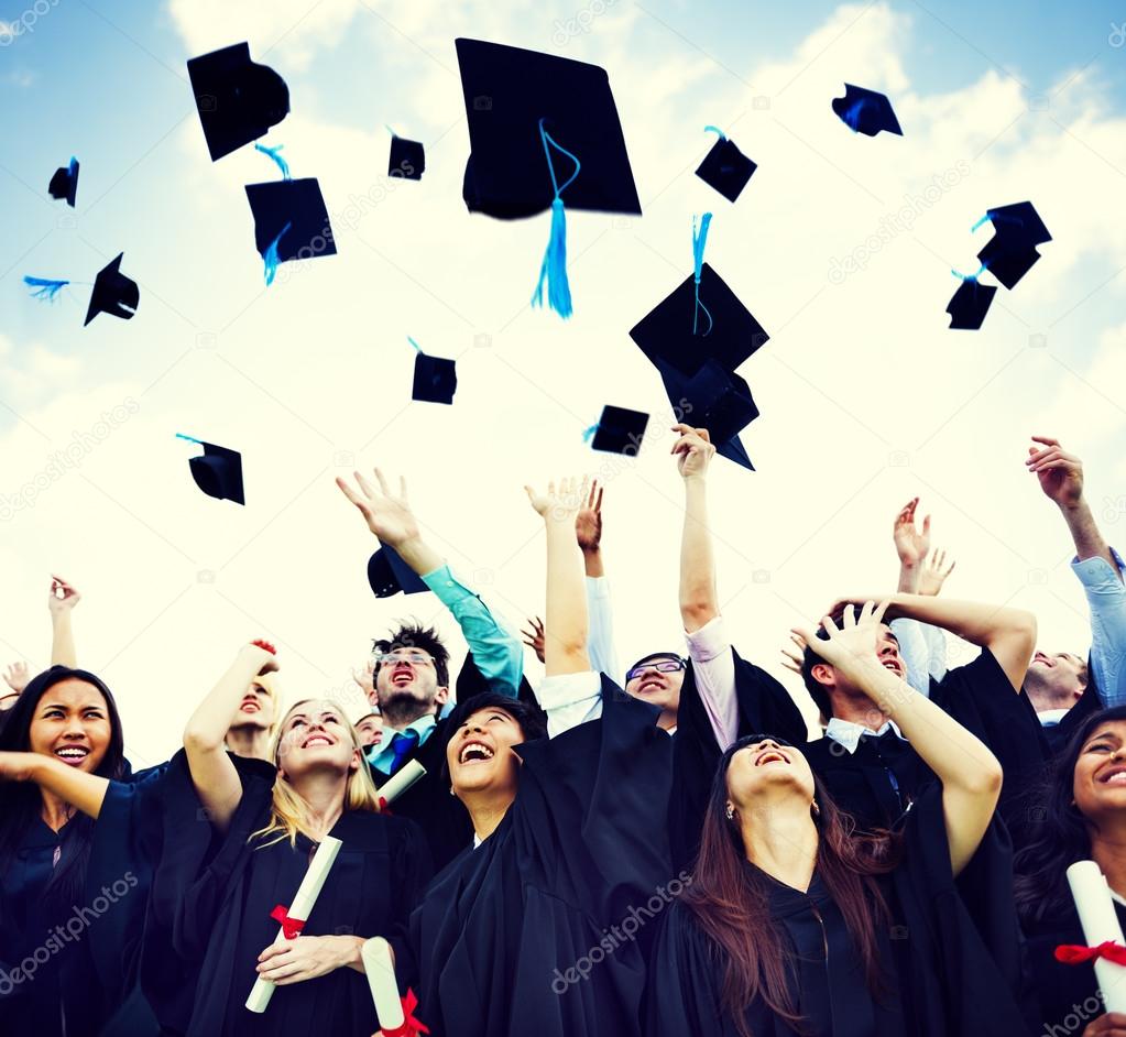 students Throw Caps in the Air