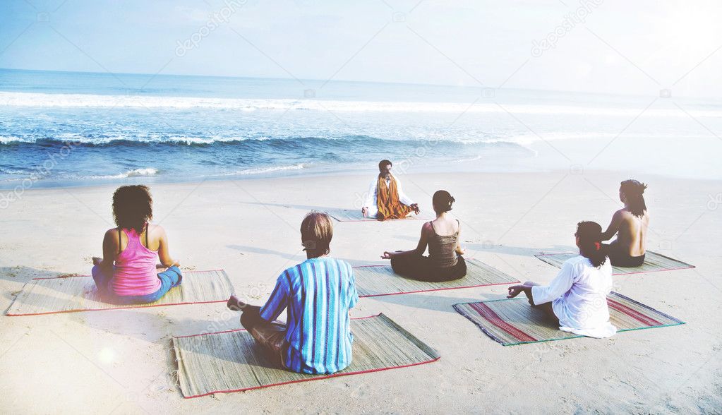 people doing exercise of yoga