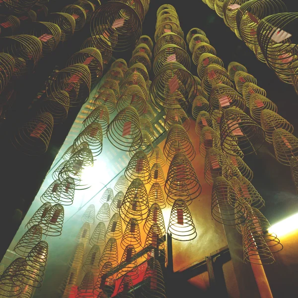 Incense coils burning in Chinese temple — Stock Photo, Image