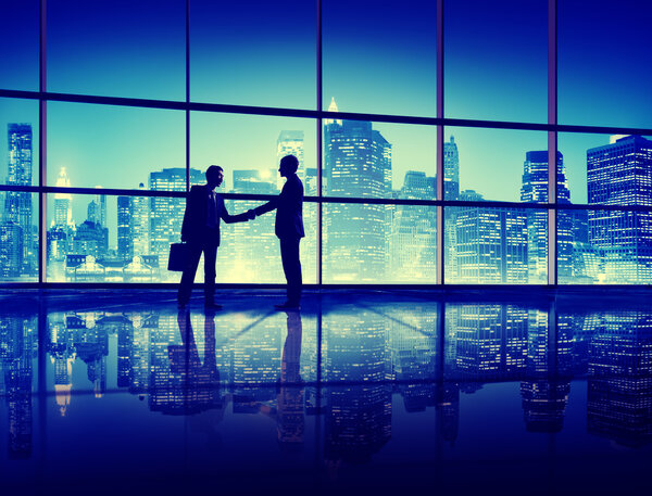 Businessmen meeting and handshake, work and buildings concept