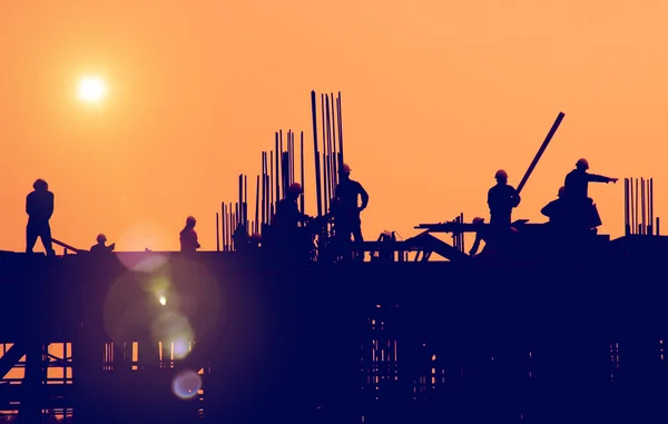 Werknemers in de bouw op Building cite — Stockfoto