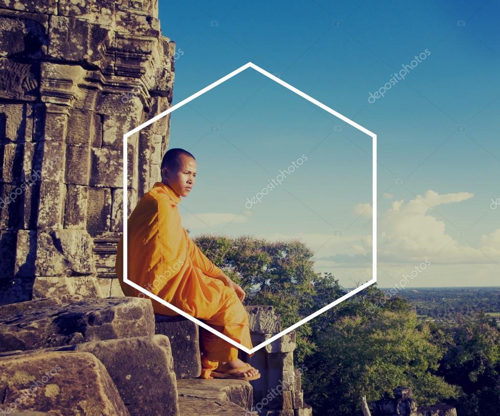 Boy in orange robe with Hexagon Icon Frame, Symbol Copy Space Concept