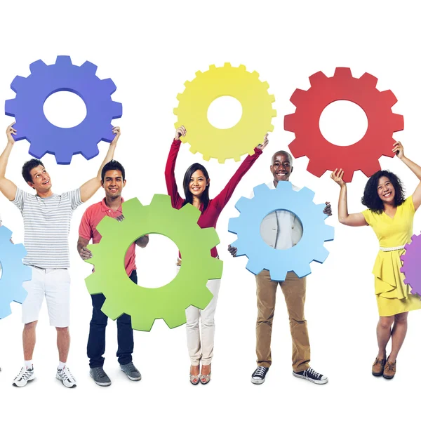 Diversity People holding Gears — Stock Photo, Image