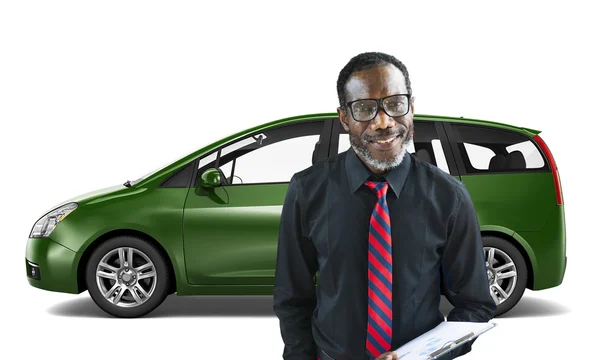 Man with Car behind him — Stock Photo, Image