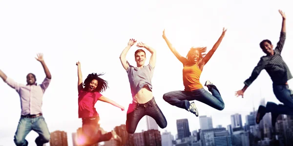 Group of multi ethnic people are jumping — Stock Photo, Image