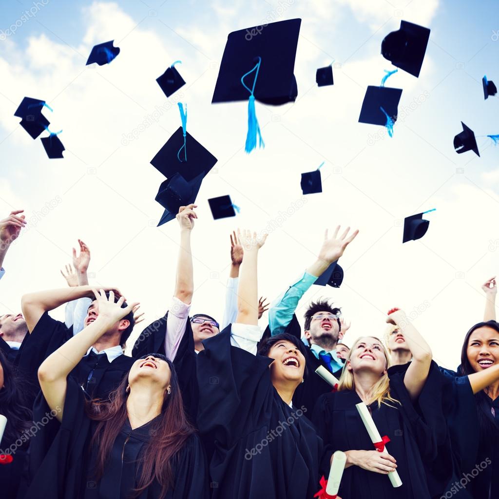 students Throw Caps in the Air