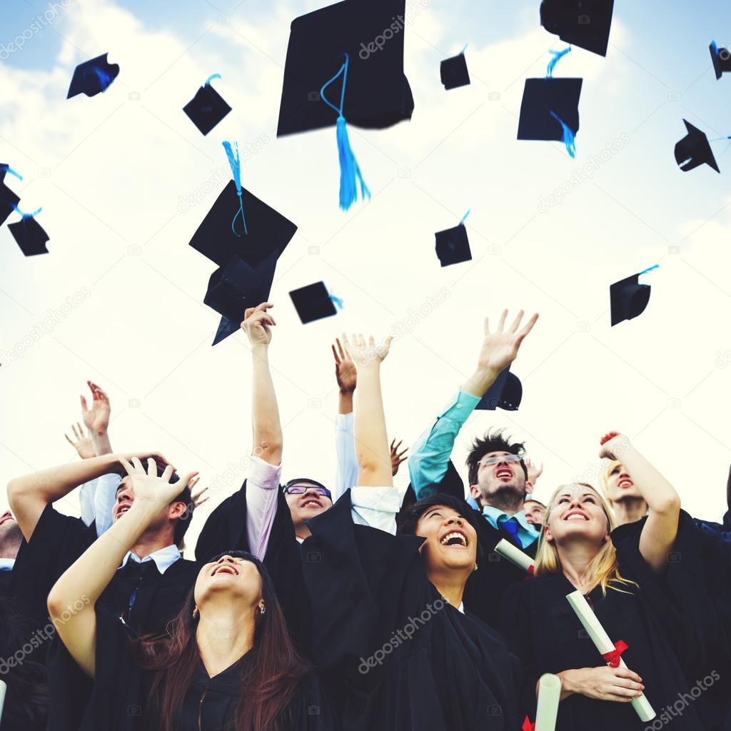 students Throw Caps in the Air