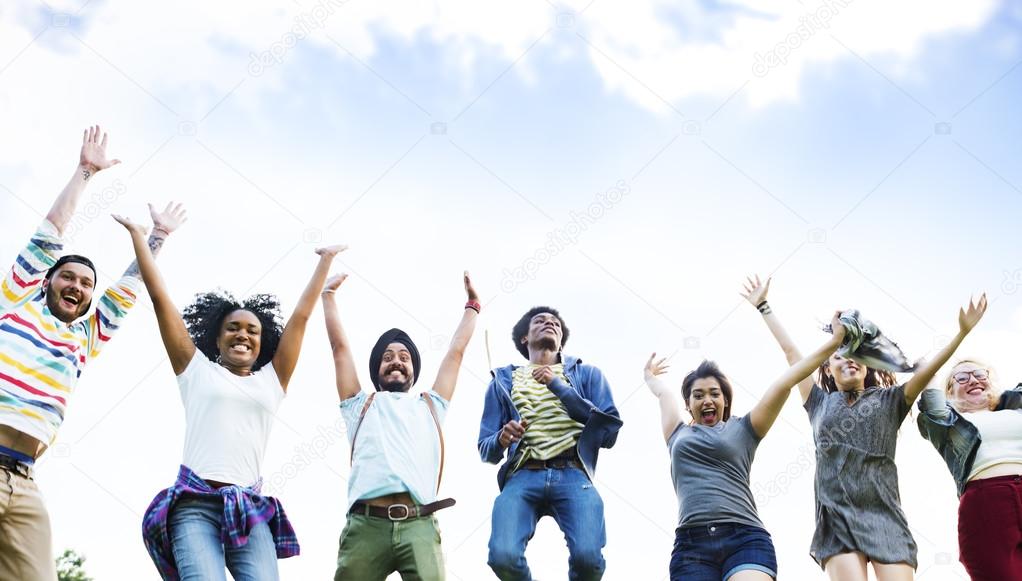 cheerful students jumping in the air