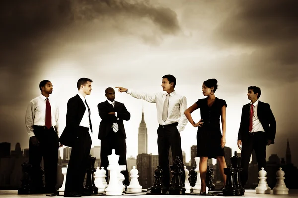 Team of Business People with chess — Stockfoto