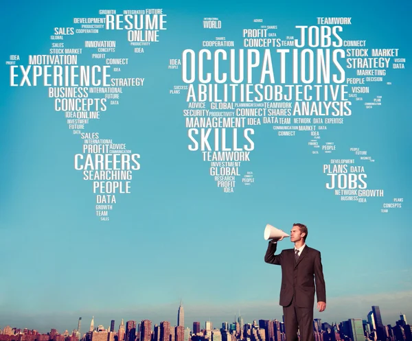 Businessman with megaphone against cityscape — Stock Photo, Image