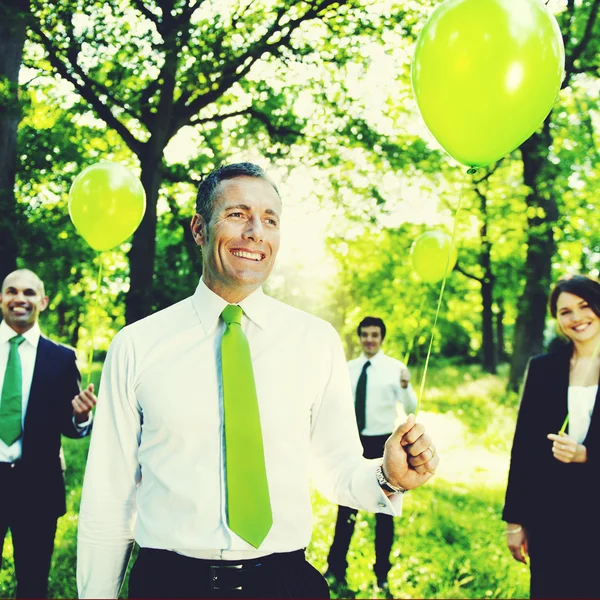 Business People with balloons — Stock Photo, Image