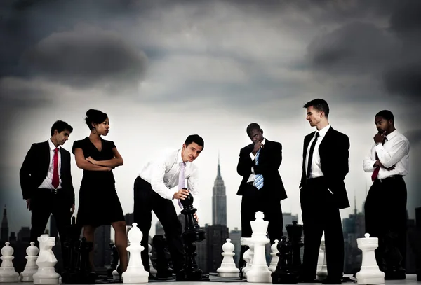Team of Business People with chess — ストック写真
