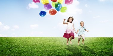 Little Girl and Boy Outdoors Concept clipart
