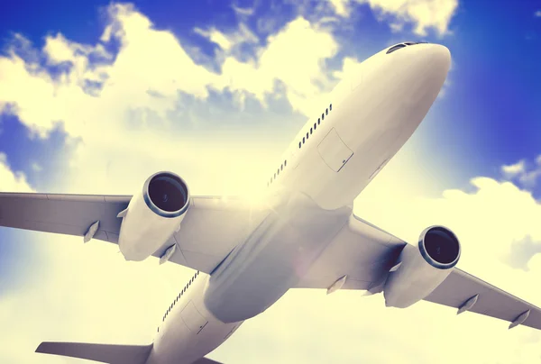 Avión volando en el cielo — Foto de Stock