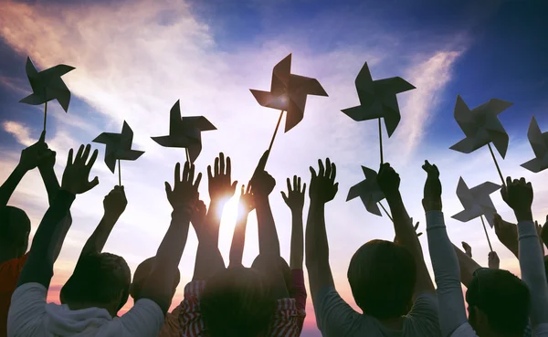 People with Wind Wheels, Togetherness Concept — Stock Photo, Image