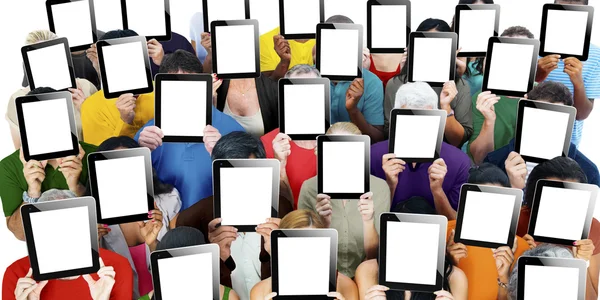 Diversidad de personas cubriendo caras por tabletas digitales — Foto de Stock