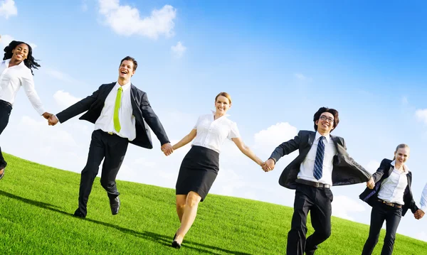 Business People holding hands — Stock Photo, Image