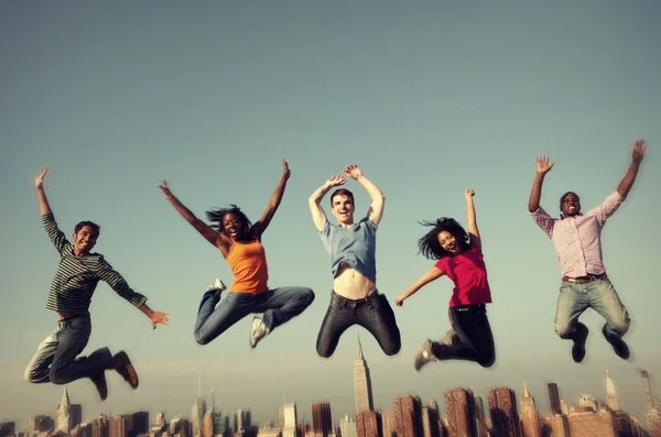 Group of multi ethnic people are jumping — Stock Photo, Image