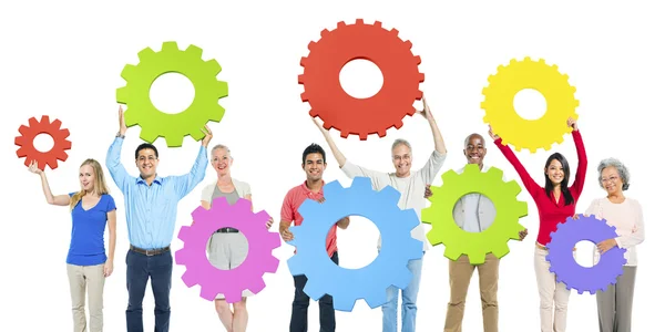 Diversity People holding Gears — Stock Photo, Image