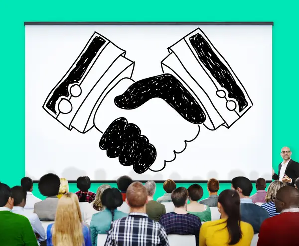 People at seminar and Handshake — Stock Photo, Image