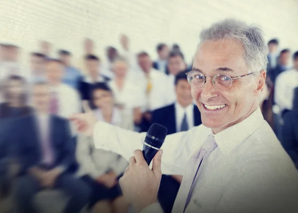 Businessman Speaker at meeting — Stock Photo, Image