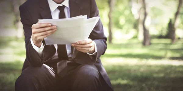 Businessman looking at failed documents — Stock Photo, Image