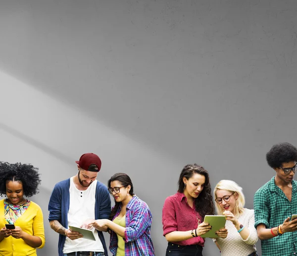 People standing on background of wall — Stock Photo, Image