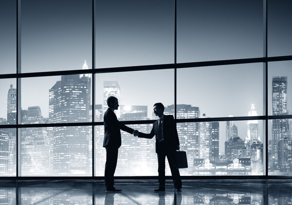 BusinessMen Handshake Silhouettes Concept