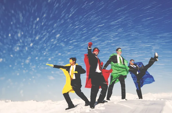 Business Superheros in Winter Snow — Stock Photo, Image