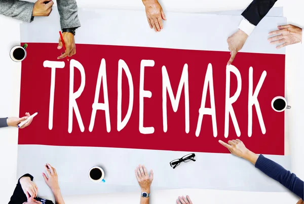 Business People Pointing on Trademark — Stock Photo, Image