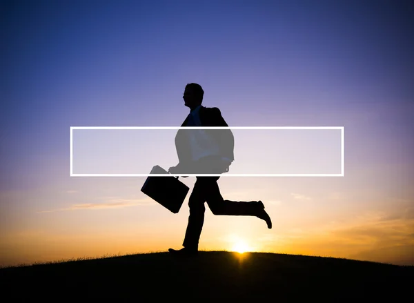 Silhouette of Businessman running — Stock Photo, Image