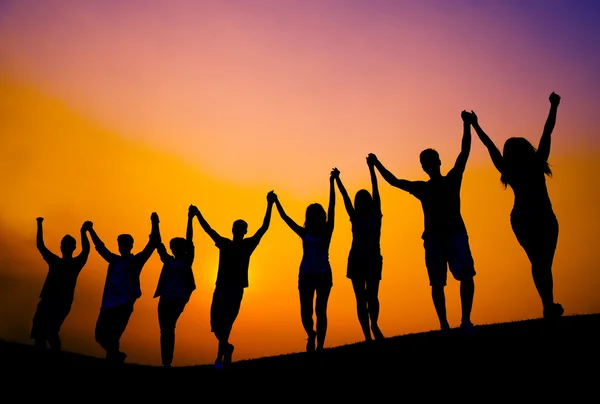 People rising hands up together — Stock Photo, Image