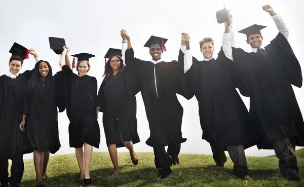 Group of students of graduates — Stock Photo, Image