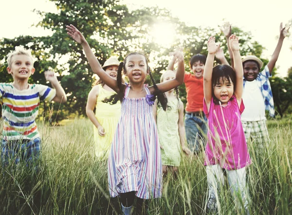 Children playing outdoors — Stock Photo, Image