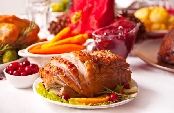 Traditional sliced honey glazed ham for festive Christmas or Thanksgiving table