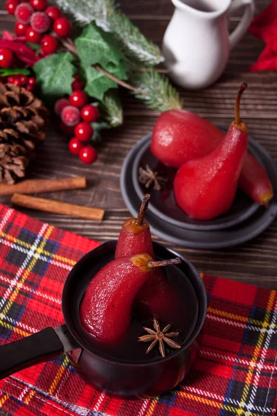 Poached pears in red wine with spices. — Stock Photo, Image