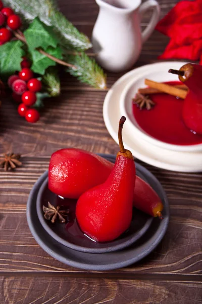 Poached pears in red wine with spices. — Stock Photo, Image