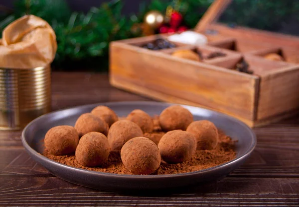 Homemade chocolate balls truffles on the plate. — Stock Photo, Image