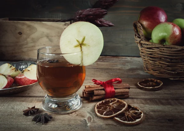 Autumn drinks with spices on the wooden table — Stock Photo, Image