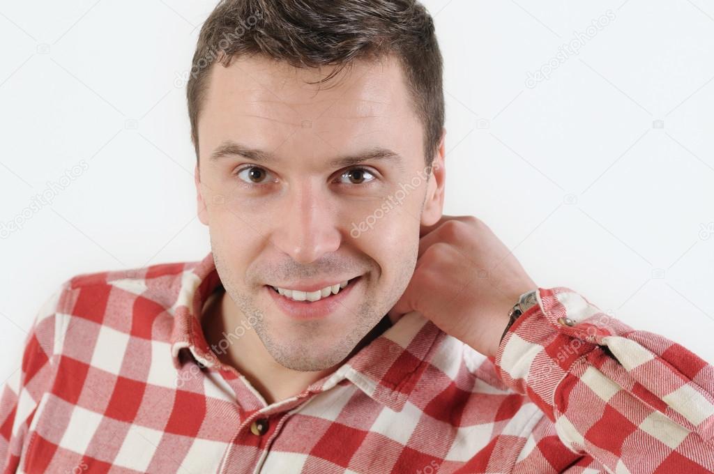 Close up portrait of young smiling man