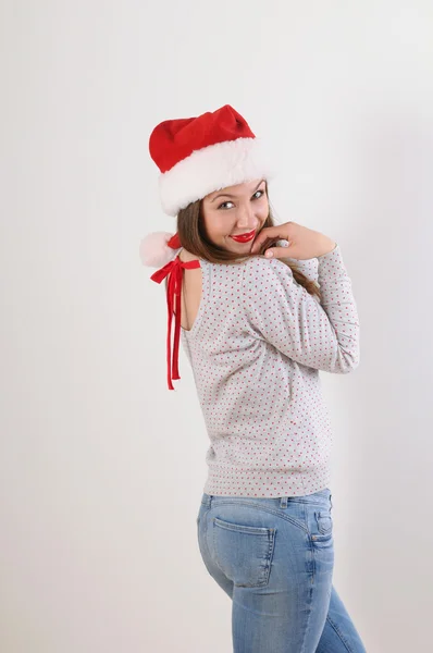 Carino giovane donna in Santa cappello su sfondo bianco — Foto Stock