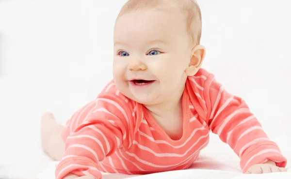 Adorable cute little girl with big blue eyes and wide smile play — Stock Photo, Image