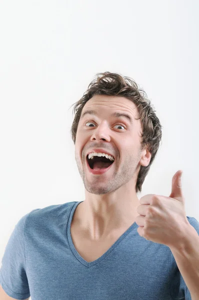 Retrato emocional de hombre joven súper satisfecho y emocionante —  Fotos de Stock