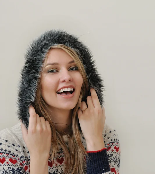 Beauty face portrait of attractive young caucasian woman in warm — Zdjęcie stockowe